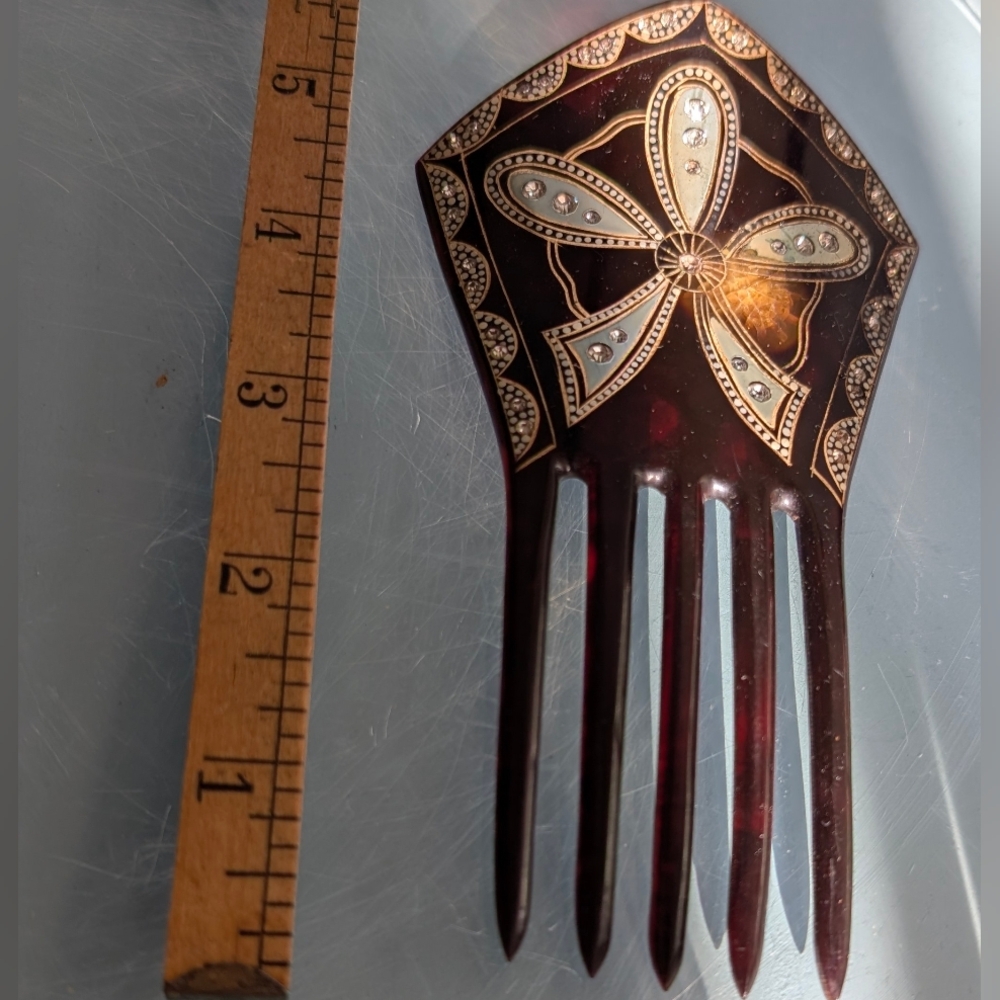 Elegant Black/Brown Hair Comb with Intricate Design